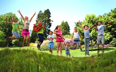bigstock-Happy-Kids-Jumping-On-Summer-F-47779420